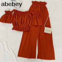 Load image into Gallery viewer, Off the shoulder Slash neck short Top + high waist slim wide leg Pants two piece set
