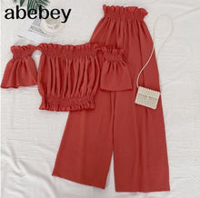 Load image into Gallery viewer, Off the shoulder Slash neck short Top + high waist slim wide leg Pants two piece set

